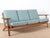 - Scandinavian 3-seater sofa designed by Hans Wegner in 1959 - Produced by Getama during the late 1960s - Features a...