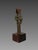 Idol, Amlash, Early 1st Millennium BC, Bronze Bronze group depicting two intertwined figures Bronze with a red and green...