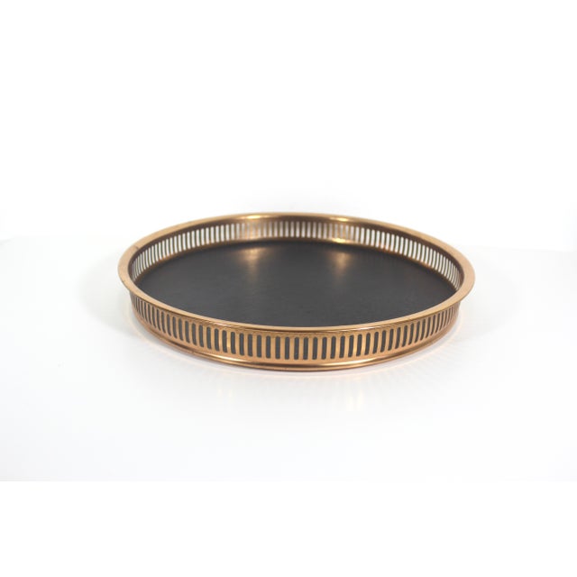 Vintage copper gallery tray with some patina and some spots of corrosion and scratches from age and use. Marked on the...