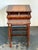 Crafted by Theodore Alexander, this elegant set of vintage wood nesting tables exemplifies the brand’s dedication to...