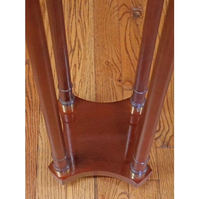 Baker Furniture Mahogany Regency Style Column Pedestal Table Dimensions : 40.25" Tall X 13" Round This pedestal was made...