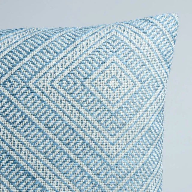 This pillow features Tortola with a Knife Edge finish. Inspired by basket designs, this concentric diamond pattern is...