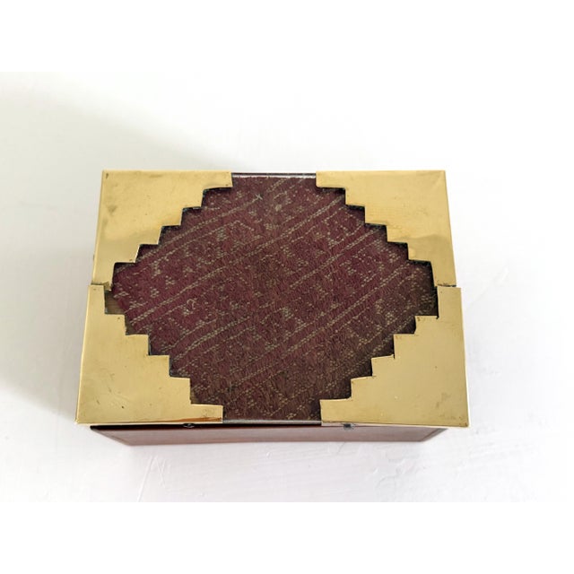 Peruvian hardwood box with pre-Columbian textile mounted under a glass frame and secured with beautiful brass detailing....
