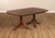 High Quality American Made Rectangular Expandable Banded Mahogany Dining Table On Double Pedestal Base with Brass Capped...