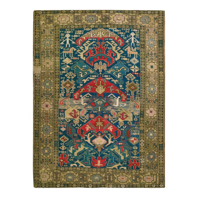 Alluring Rustic Tribal With Whimsical Geometric People and Animals Set of a Lovely Blue Background Antique Caucasian Rug For Sale