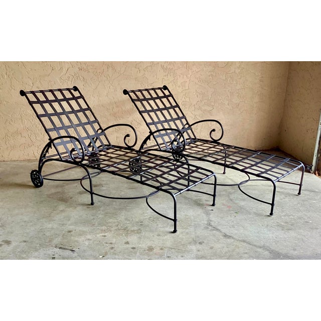 A fine pair of Richard Frinier designed for Brown Jordan “Florentine” pattern outdoor adjustable chaise loungers....