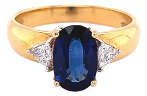 2.32 Carat Oval Cut Blue Sapphire with Trillion Cut Diamond Side in 18k Gold, Size 8