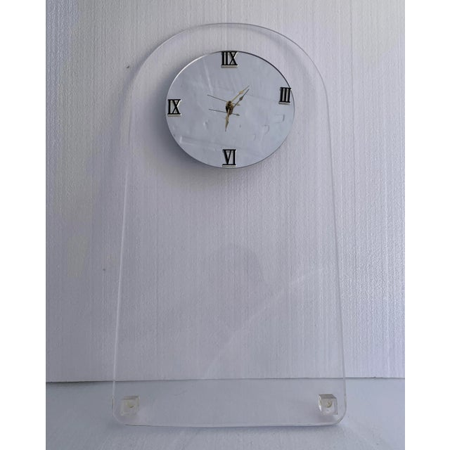 1970s mid century modern lucite wall clock. This minimalist piece is perfect for adding that touch of classic mcm feel for...