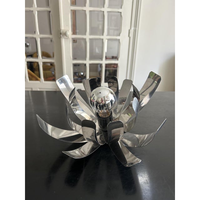 Chrome-plated metal lamp in the shape of a flower, petals adjustable to the desired shape, 1970s attributed to Michel...