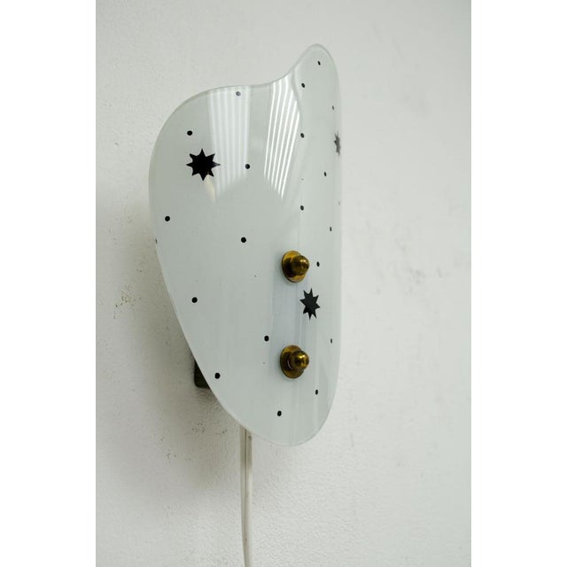 This freeform wall light with stars on the glass looks pretty amazing in the dark . Measurements H 20 cm, B 14 cm...