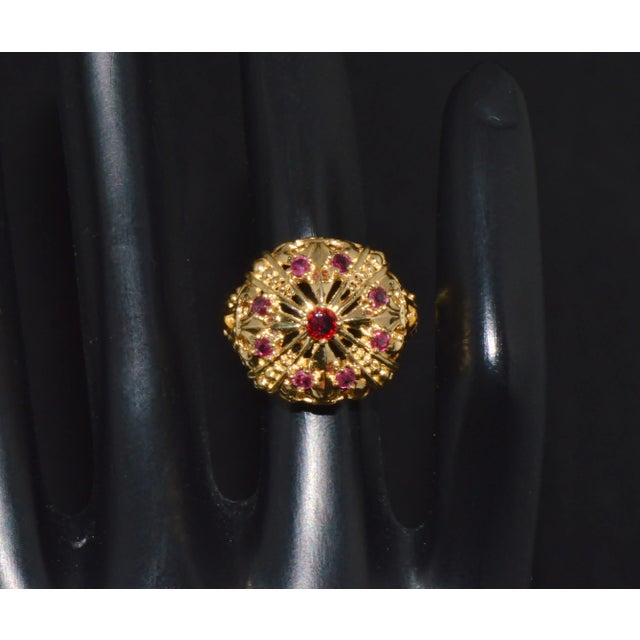Vintage 1979 Franklin Mint 18K solid gold ruby crown fleur-de-lis ring. This finely crafted 18K solid gold dome ring...