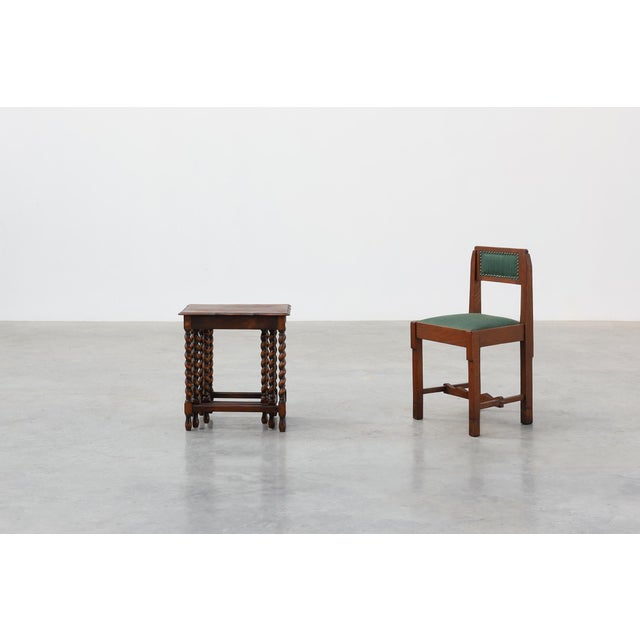 A handsome English set of three oak nesting tables dating from the turn of the twentieth century. Crafted in solid oak,...