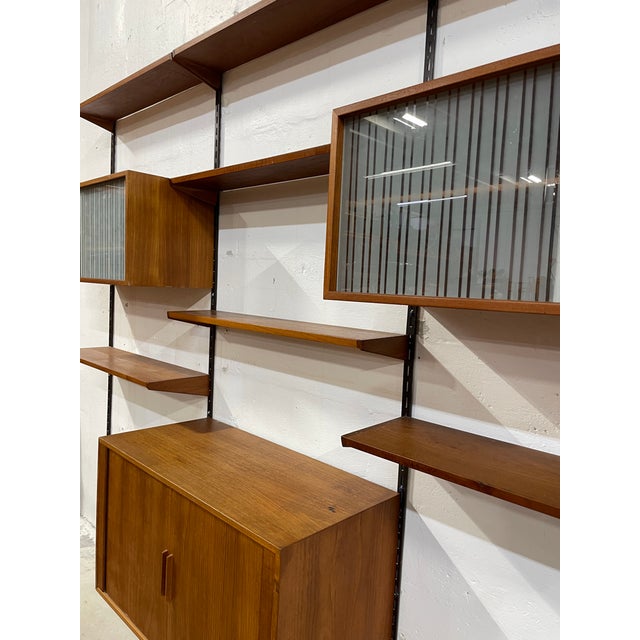 Kai Kristiansen for FM Mobler 3-bay wall unit. 102.5w 16.25d 69 rail length