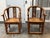 Design Plus Gallery presents a Pair of Antique Chinese Horseshoe Armchairs. Sweeping curved backs extend into rounded...