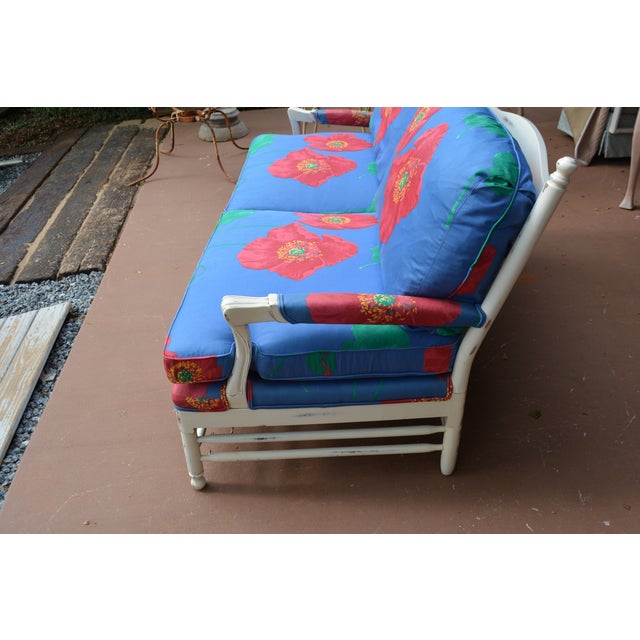 This is a gorgeous loveseat! Vibrant upholstery. Fitted edge seat cushions. Comfortable med/soft seating, some...