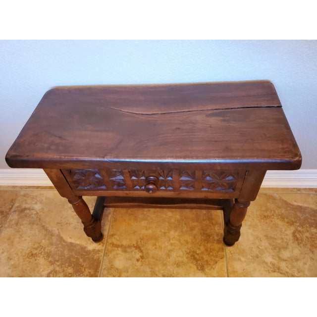 A charming antique Spanish Baroque low table / stool / bench with beautifully aged dark rich patina. circa 1880 Born in...