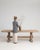 A generously scaled French oak trestle dining table, embodying rustic craftsmanship and enduring construction. The solid...