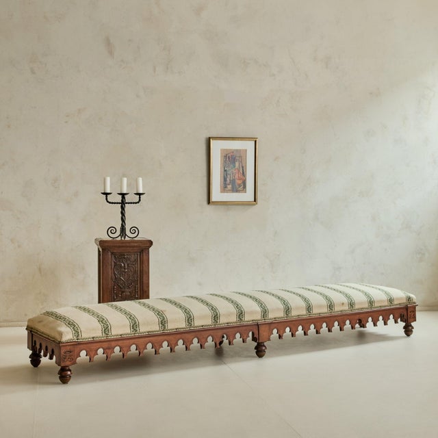 An antique French carved oak pedestal with an inset marble top, distinguished by its expressive Art Nouveau ornamentation....