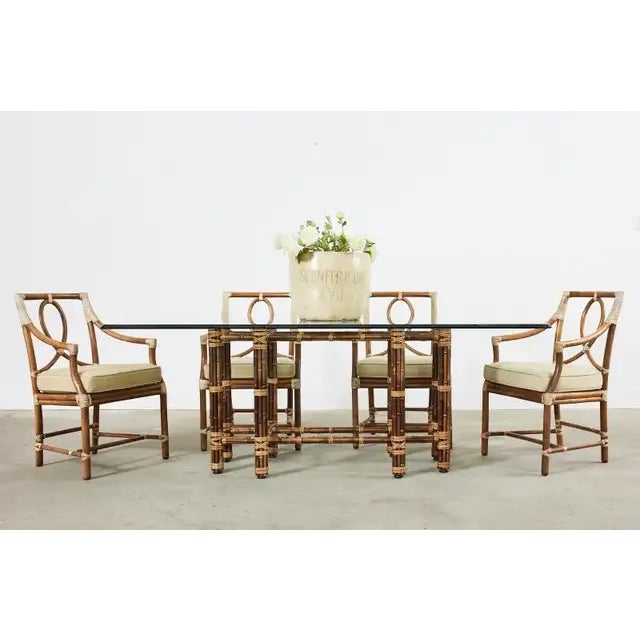 Stunning bamboo rectangular dining table made in the California organic modern style by McGuire. This is a genuine McGuire...
