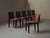 Set of six chairs, crafted in solid oak and oak veneer, they embodies a restrained and architectural aesthetic...