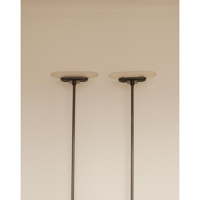 A rare and elegant pair of “Jill” floor lamps designed by Perry A. King, Santiago Miranda, and Gianluigi Arnaldi for...