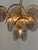 Elegant vintage chandelier attributed to Gino Vistosi for Murano, featuring a sophisticated brass structure adorned with...