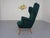 French wingback chair from the 1950s, upholstered in dark green Kvadrat Tonica fabric and completely reupholstered....