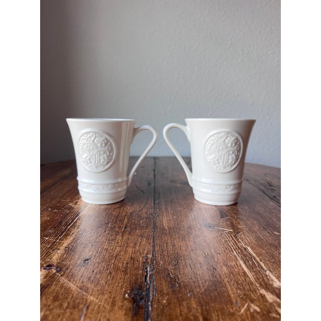 Belleek Pottery Irish Craft Mugs Set of 2 Made in Ireland 4.5” width, 3 3/8” depth and 4” height No chips nor cracks. Some...