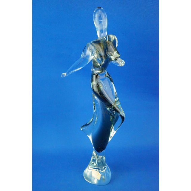 Large Murano blown and sommerso glass sculpture, entirely hand-crafted, depicting a stylized woman wearing a skirt. The...