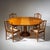 Dining group consisting of a round extension table and four matching chairs in the faux bamboo style. The table extends to...