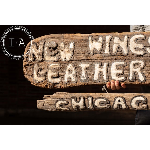 Pair of handcrafted storefront signs made for New Wineskins Leather Gallery, formerly located at 63 W. Division St. in...