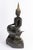 Patinated bronze sculpture of a seated Buddha, 17th century. 17th-century patinated bronze sculpture depicting a seated...