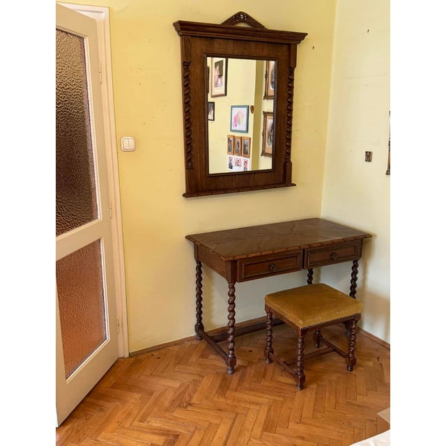 Elegant early 20th-century Spanish-style colonial dressing set crafted from solid oak. This exquisite set includes a...