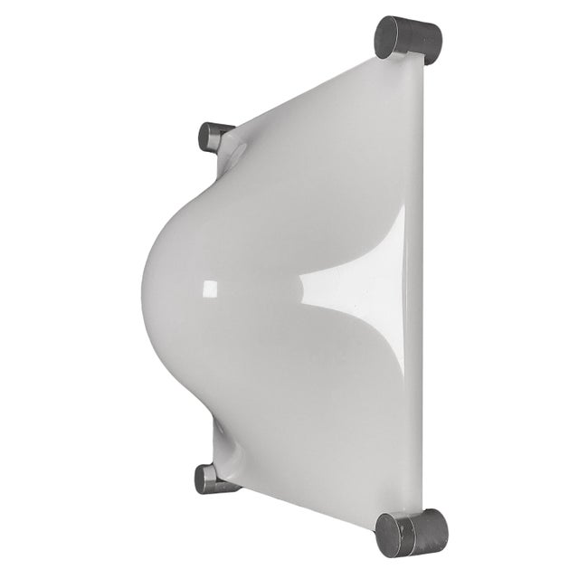 - Designed by Elio Martinelli - The lamp can be hung from the ceiling or wall-mounted - Made of white Acrylic Glass -...