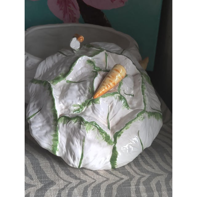 Cabbage Soup Bowl with ladle and carrot design. Small chip as seen in the photos above. Hold about 8 quarts of soup.