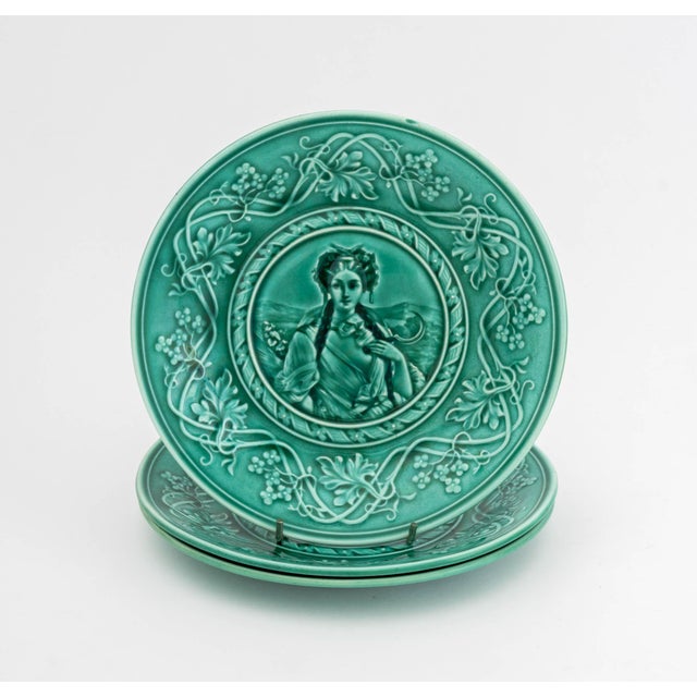 Emile Regal and Jules Sanejouand Majolica Portrait Ceramic Tableware Pieces, comprising: five plates and one cake plate on...