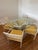 Vintage Kessler faux bamboo aluminum dining set. Classic faux bamboo details with upholstered seats. Table has a glass top...