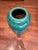 Beautiful large ceramic floor vase with a rich green glazed finish and subtle natural variations throughout. This piece...
