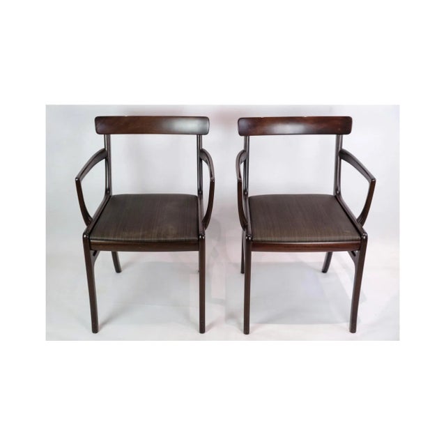 Set of two mahogany rungstedlund armchairs by ole wancher for poul jeppesen furniture factory. Stands in very fine vintage...