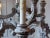 This impressive French 20th-century chandelier is a finely carved work in wood, distinguished by its grand scale and...