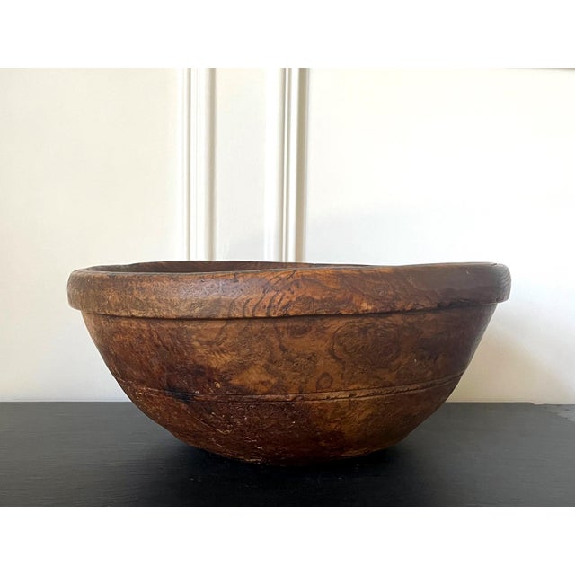 A large American turned wood bowl with impressive burl grains and original surface circa early to mid-19th century, likely...