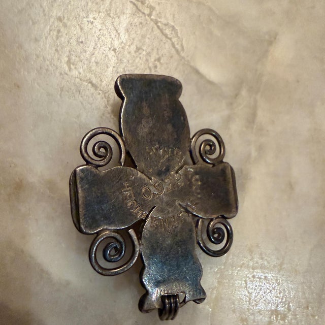 For your consideration, a vintage Matilde Poulat ("Matl") Mexican silver and turquoise cross pendant, often featuring a...