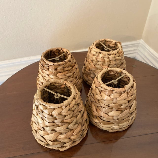 Add this handwoven water hyacinth lampshade to your sconce for a natural aesthetic. 4 available, Sold as a pair!