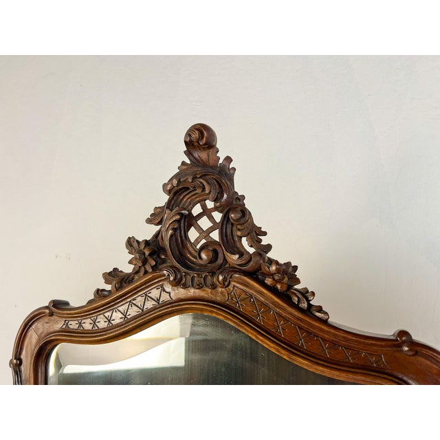 Handcrafted in walnut and inspired by the elegant proportions of Louis XV furniture, this vintage French vanity combines...