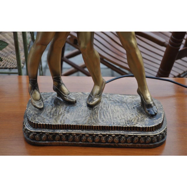 Art Deco Style Bronze Dancers Table Lamp, 1980s, in Good conditions. Designed 1980 to 1989 UK Plug (up to 250V).The wiring...