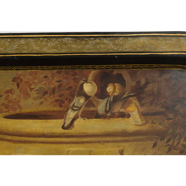 An English painted tôle tray from the 19th century, adorned with dog motifs. Created in England during the 19th century,...