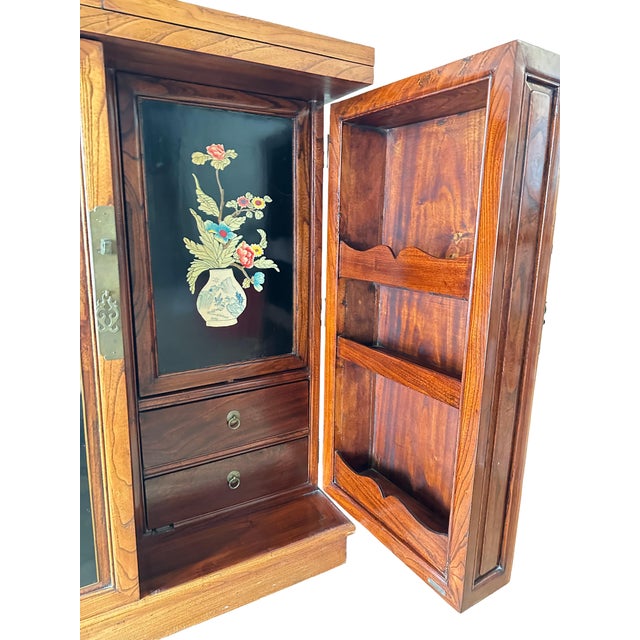 This exceptional and 100% authentic Japanese bar cabinet is a refined example of mid-century Japanese craftsmanship,...
