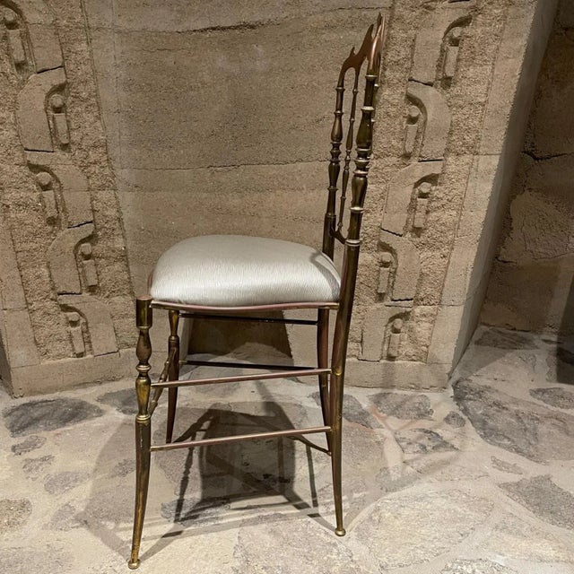 AMBIANIC presents 1950s Chiavari Chair in Bronze Italy patinated bronze sophisticated upholstery in light gray. 36 H x 15...
