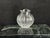 Clear crystal vase with a scalloped, ruffled rim and an all-over spiral swirl-cut pattern. No chips or cracks.