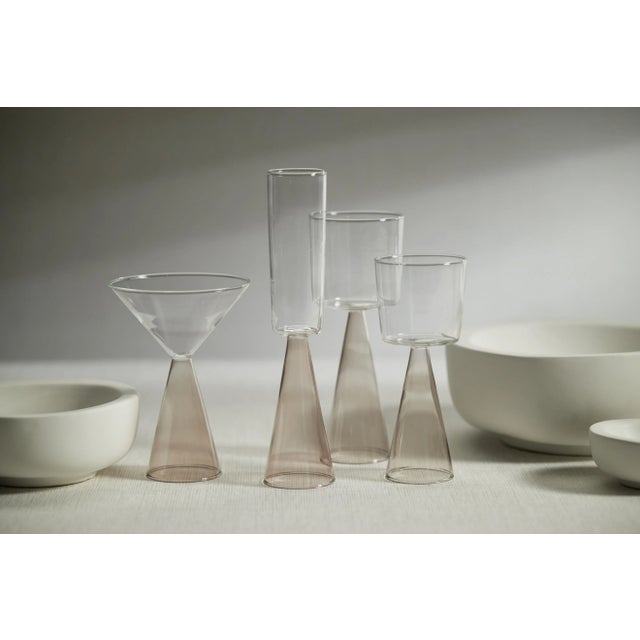 This set comprises four white wine glasses, perfect for enhancing the drinking experience of your favorite white wine. The...